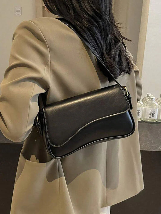 ZARA - CURVED BAG